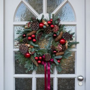 Red And Green Leafy Wreath With Balbals On Door