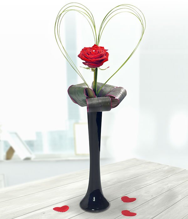 Single Red Rose Displayed In A Elegant Black Vase