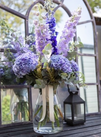 Purple Mixed Flower Bouquet In A Glass Vase