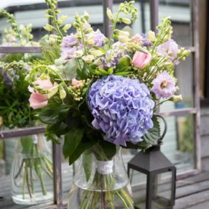 Pink And Blue Mixed Bouquet In A Glass Vase